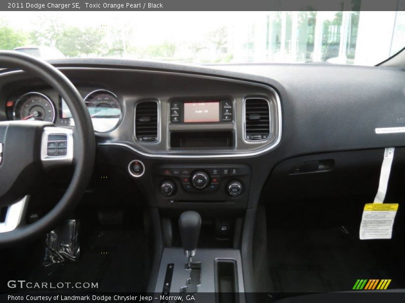 Toxic Orange Pearl / Black 2011 Dodge Charger SE