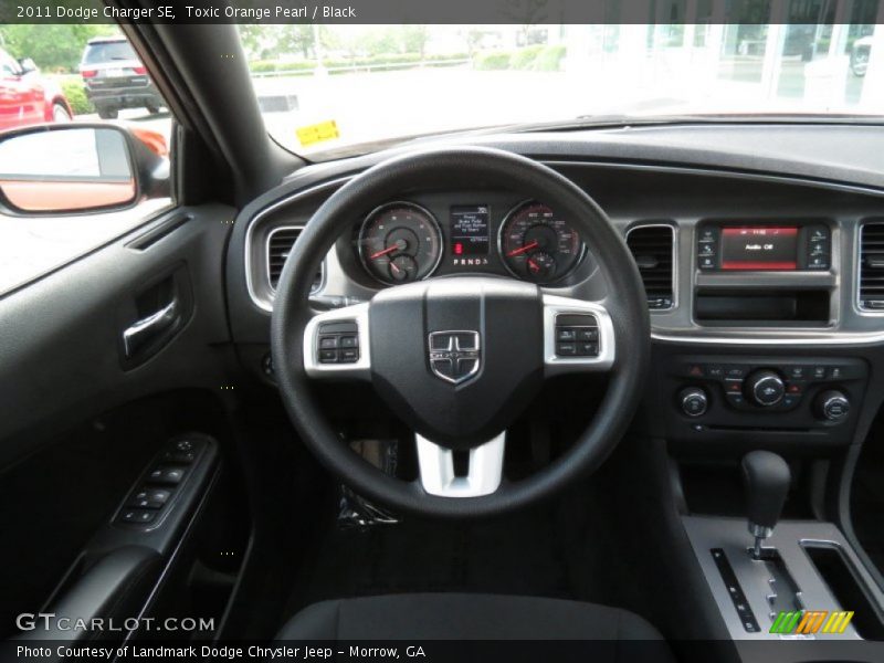 Toxic Orange Pearl / Black 2011 Dodge Charger SE