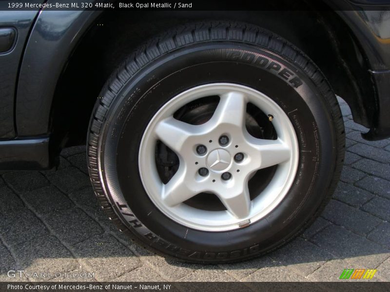 Black Opal Metallic / Sand 1999 Mercedes-Benz ML 320 4Matic