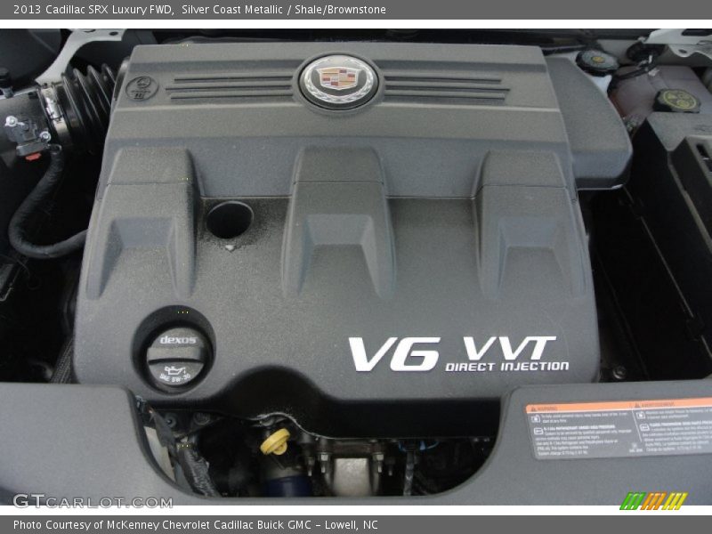 Silver Coast Metallic / Shale/Brownstone 2013 Cadillac SRX Luxury FWD