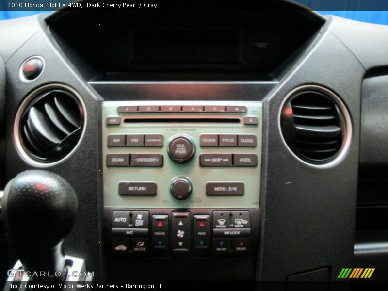 Dark Cherry Pearl / Gray 2010 Honda Pilot EX 4WD