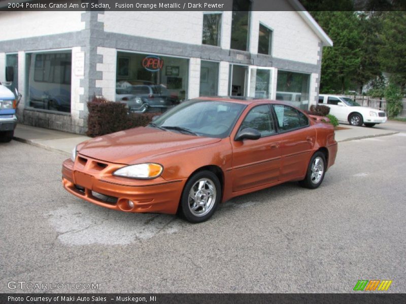 Fusion Orange Metallic / Dark Pewter 2004 Pontiac Grand Am GT Sedan