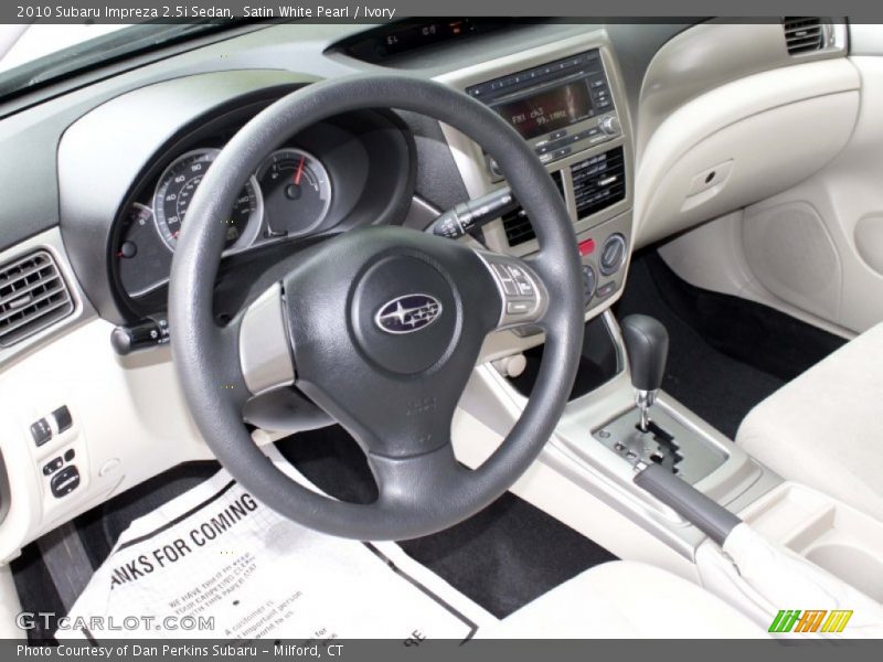 Satin White Pearl / Ivory 2010 Subaru Impreza 2.5i Sedan