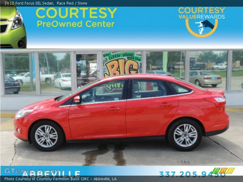 Race Red / Stone 2012 Ford Focus SEL Sedan