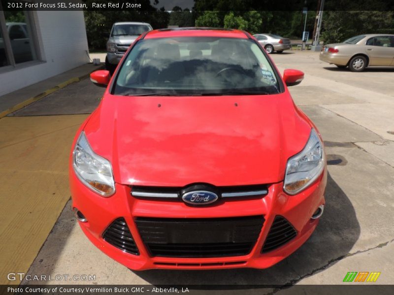 Race Red / Stone 2012 Ford Focus SEL Sedan