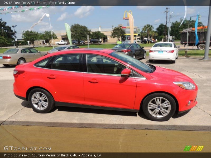 Race Red / Stone 2012 Ford Focus SEL Sedan