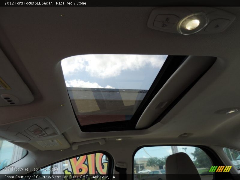 Race Red / Stone 2012 Ford Focus SEL Sedan