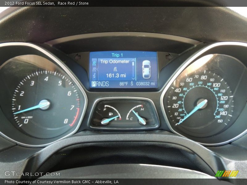 Race Red / Stone 2012 Ford Focus SEL Sedan