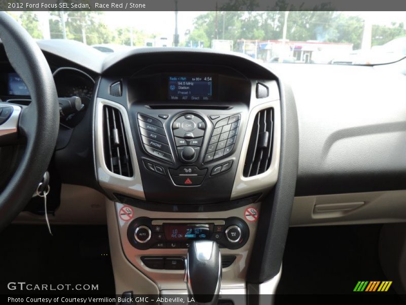Race Red / Stone 2012 Ford Focus SEL Sedan