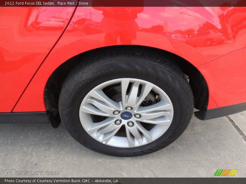 Race Red / Stone 2012 Ford Focus SEL Sedan