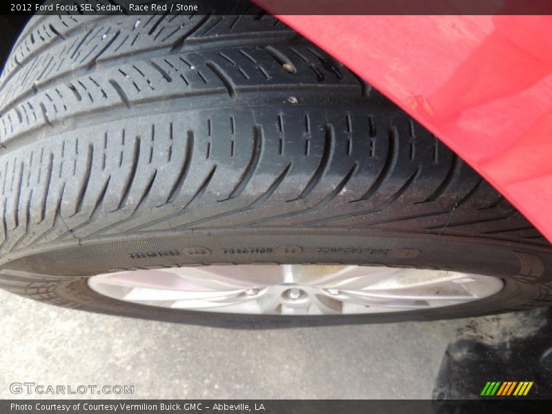 Race Red / Stone 2012 Ford Focus SEL Sedan