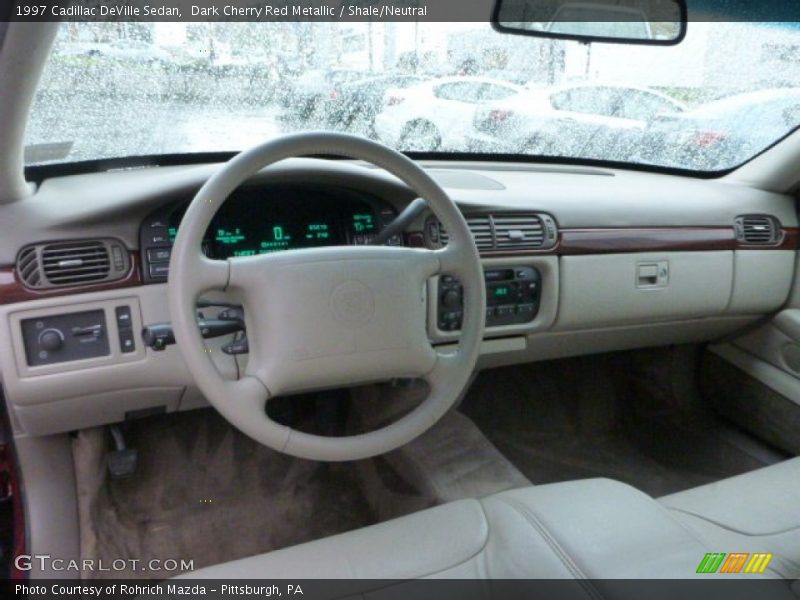 Dark Cherry Red Metallic / Shale/Neutral 1997 Cadillac DeVille Sedan