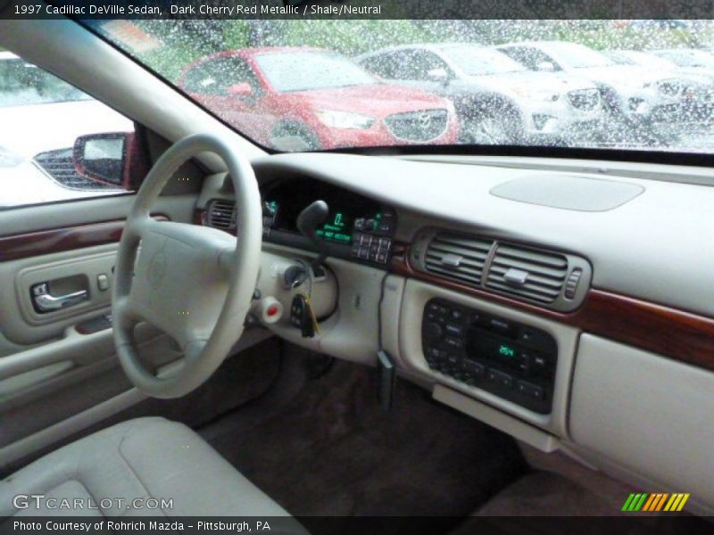 Dark Cherry Red Metallic / Shale/Neutral 1997 Cadillac DeVille Sedan