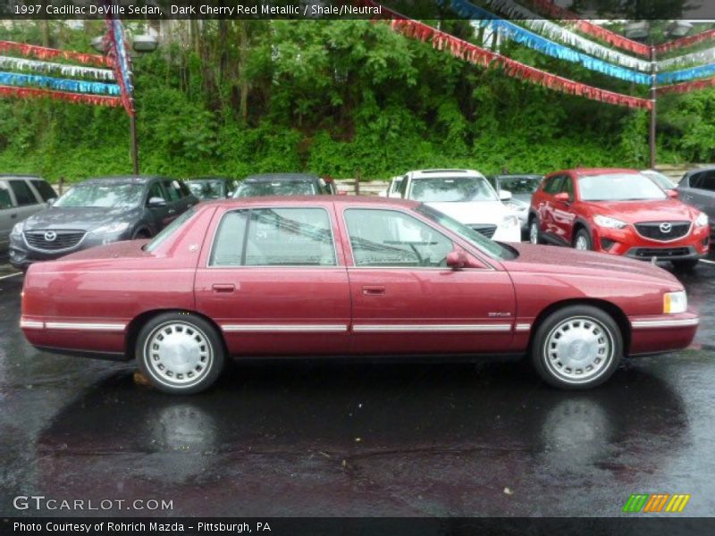Dark Cherry Red Metallic / Shale/Neutral 1997 Cadillac DeVille Sedan
