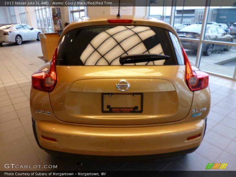 Atomic Gold / Black/Red/Red Trim 2013 Nissan Juke SL AWD