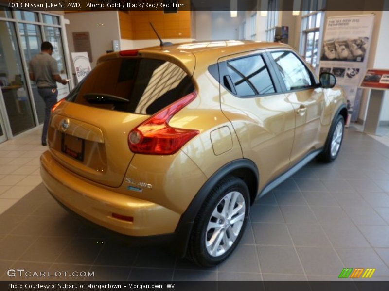 Atomic Gold / Black/Red/Red Trim 2013 Nissan Juke SL AWD