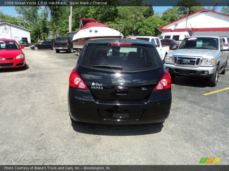Super Black / Charcoal 2009 Nissan Versa 1.8 SL Hatchback