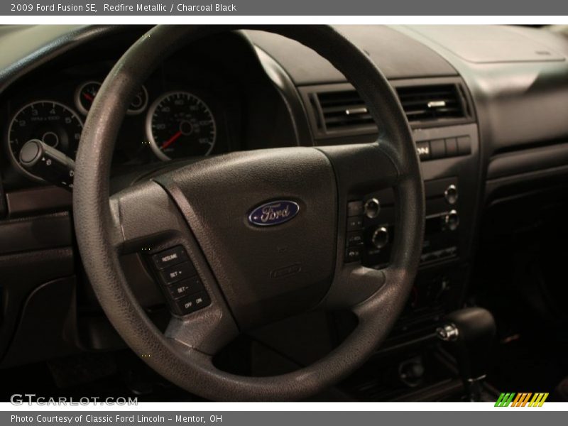 Redfire Metallic / Charcoal Black 2009 Ford Fusion SE