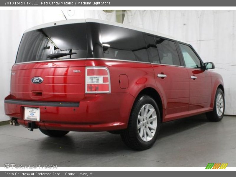 Red Candy Metallic / Medium Light Stone 2010 Ford Flex SEL
