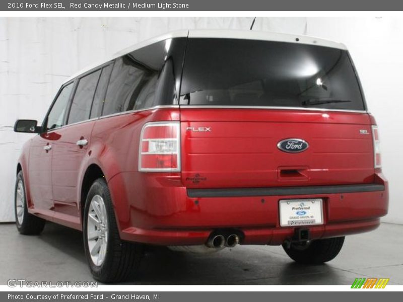 Red Candy Metallic / Medium Light Stone 2010 Ford Flex SEL