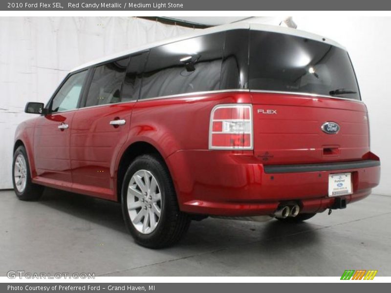 Red Candy Metallic / Medium Light Stone 2010 Ford Flex SEL