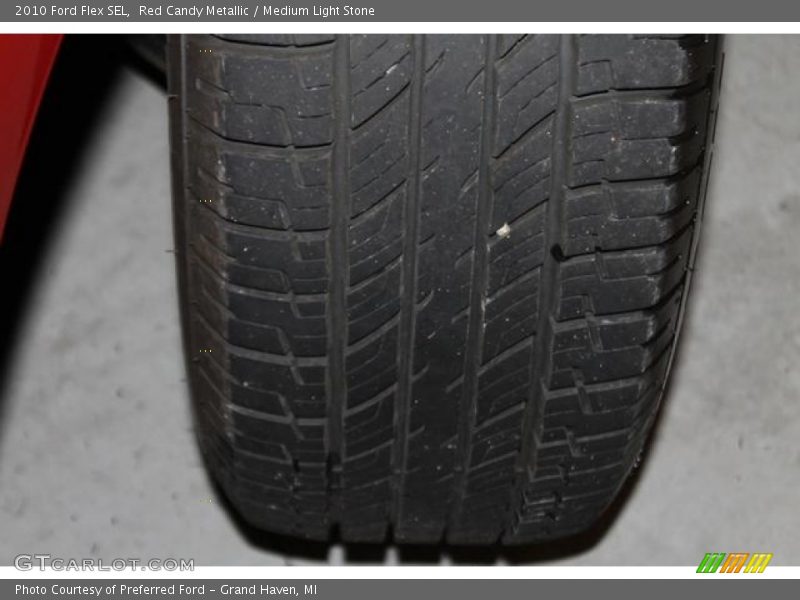 Red Candy Metallic / Medium Light Stone 2010 Ford Flex SEL