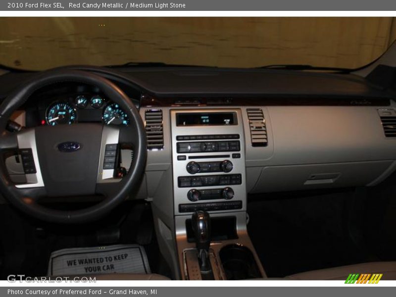 Red Candy Metallic / Medium Light Stone 2010 Ford Flex SEL