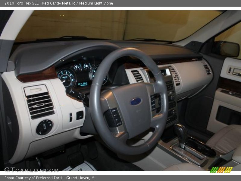 Red Candy Metallic / Medium Light Stone 2010 Ford Flex SEL