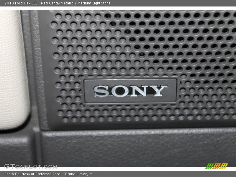 Red Candy Metallic / Medium Light Stone 2010 Ford Flex SEL