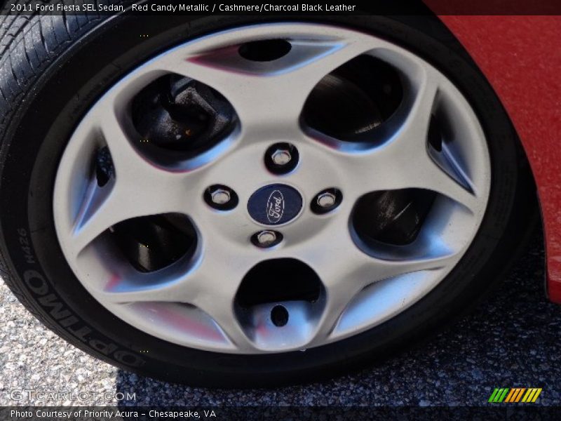 Red Candy Metallic / Cashmere/Charcoal Black Leather 2011 Ford Fiesta SEL Sedan
