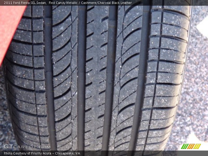 Red Candy Metallic / Cashmere/Charcoal Black Leather 2011 Ford Fiesta SEL Sedan