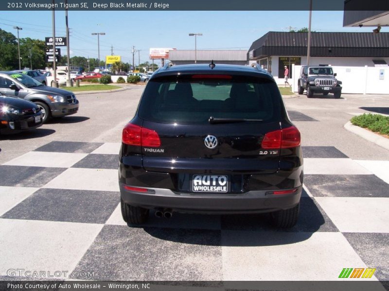 Deep Black Metallic / Beige 2012 Volkswagen Tiguan SE