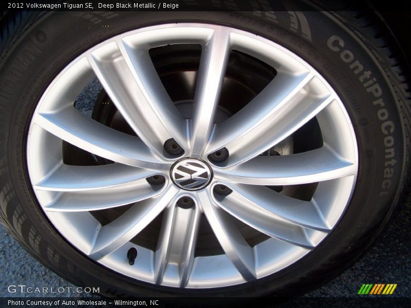 Deep Black Metallic / Beige 2012 Volkswagen Tiguan SE