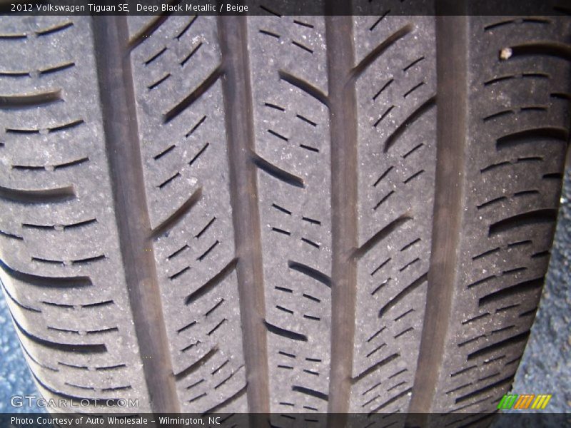 Deep Black Metallic / Beige 2012 Volkswagen Tiguan SE