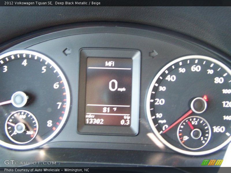 Deep Black Metallic / Beige 2012 Volkswagen Tiguan SE