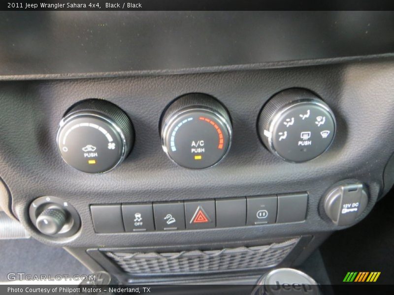 Black / Black 2011 Jeep Wrangler Sahara 4x4