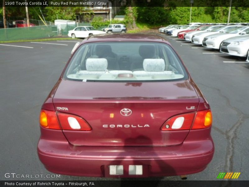 Ruby Red Pearl Metallic / Gray 1998 Toyota Corolla LE