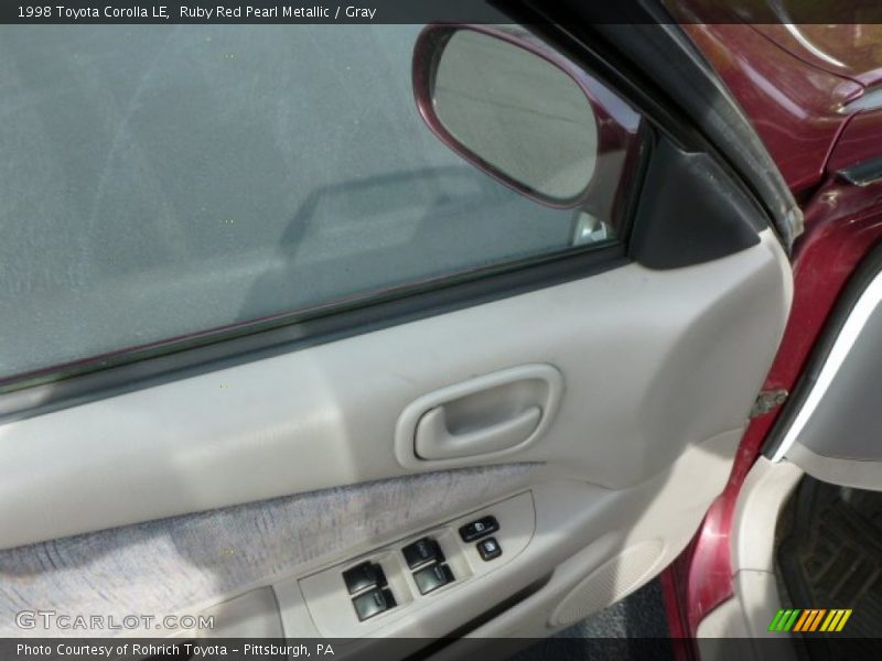 Ruby Red Pearl Metallic / Gray 1998 Toyota Corolla LE