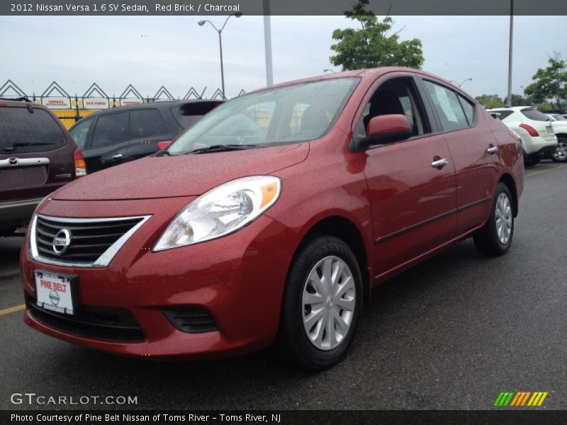 Red Brick / Charcoal 2012 Nissan Versa 1.6 SV Sedan