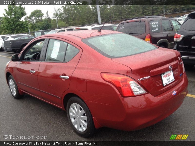 Red Brick / Charcoal 2012 Nissan Versa 1.6 SV Sedan