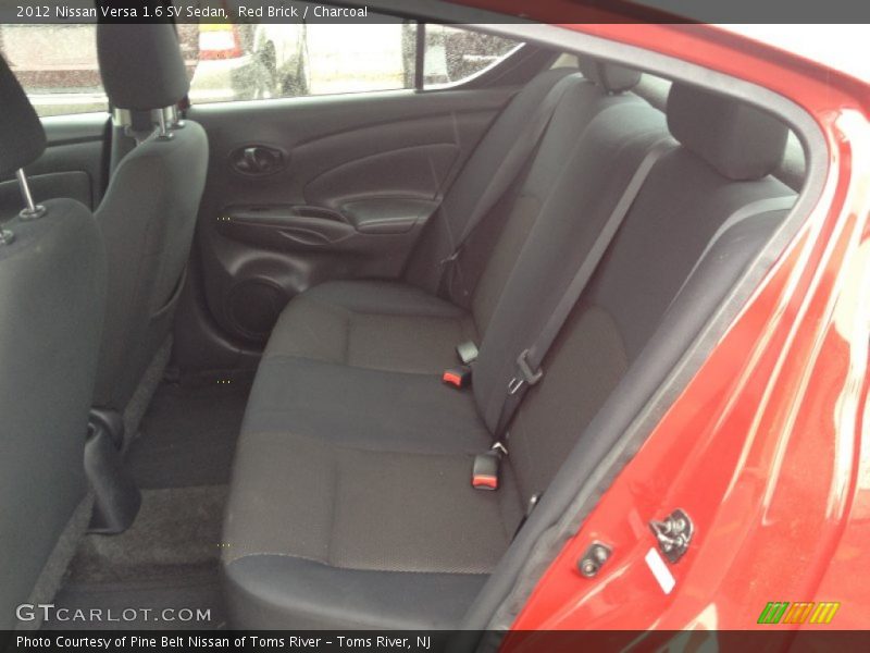 Red Brick / Charcoal 2012 Nissan Versa 1.6 SV Sedan
