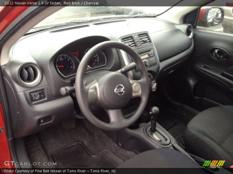 Red Brick / Charcoal 2012 Nissan Versa 1.6 SV Sedan
