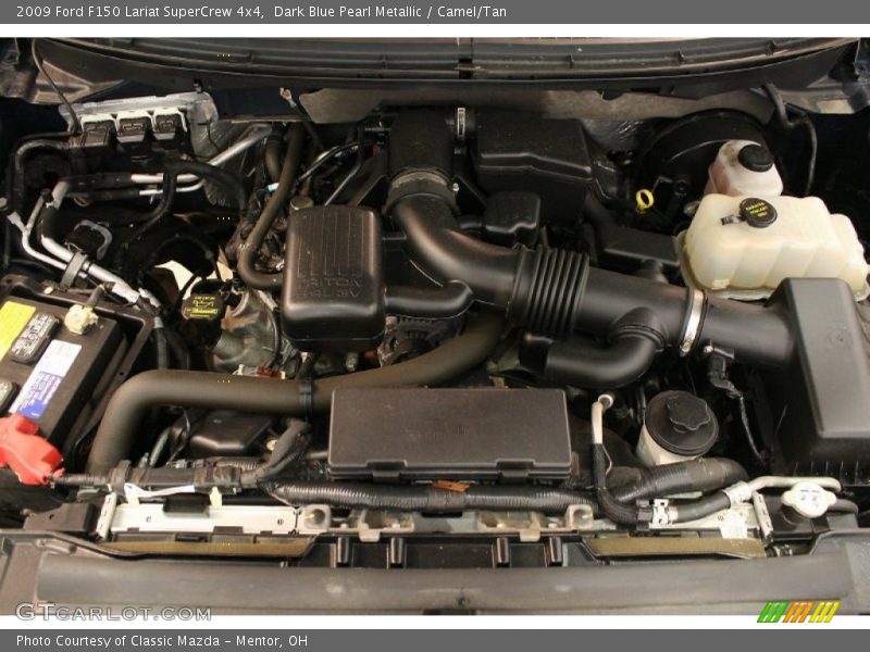 Dark Blue Pearl Metallic / Camel/Tan 2009 Ford F150 Lariat SuperCrew 4x4
