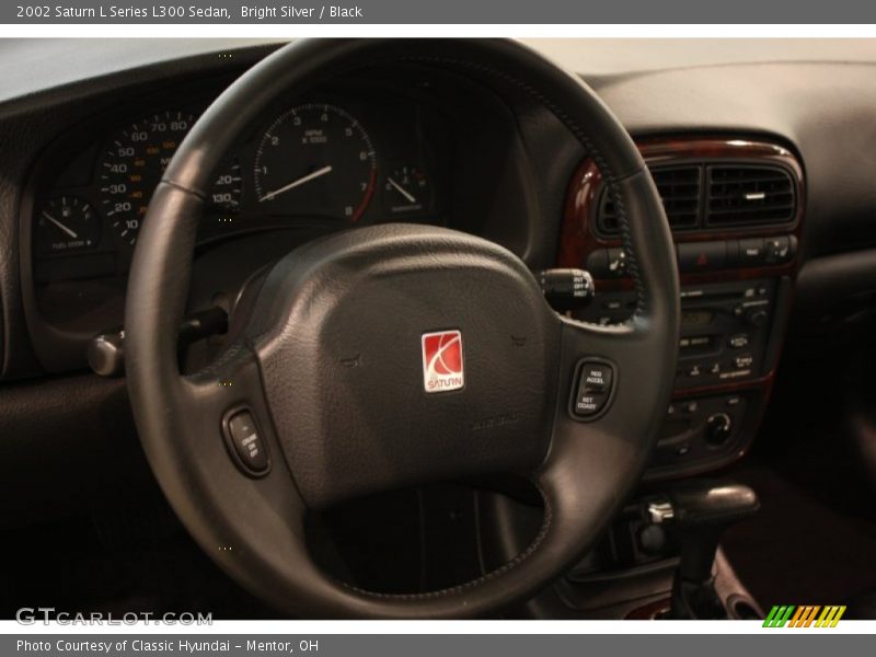 Bright Silver / Black 2002 Saturn L Series L300 Sedan