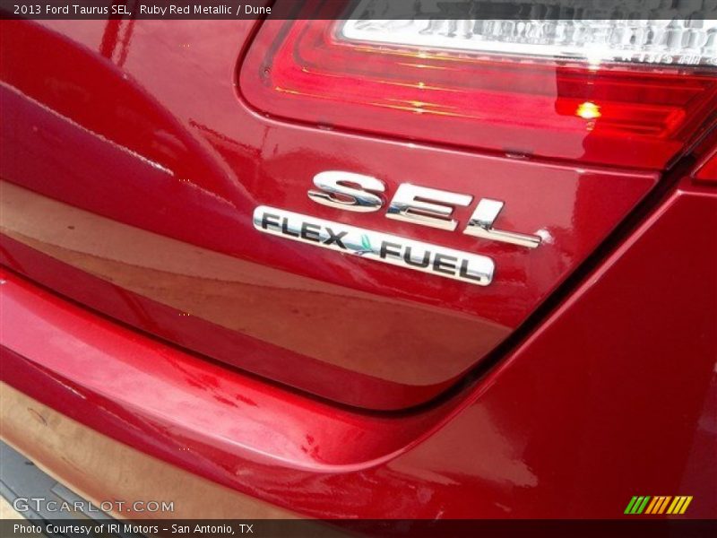 Ruby Red Metallic / Dune 2013 Ford Taurus SEL