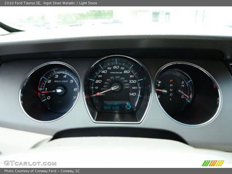 Ingot Silver Metallic / Light Stone 2010 Ford Taurus SE