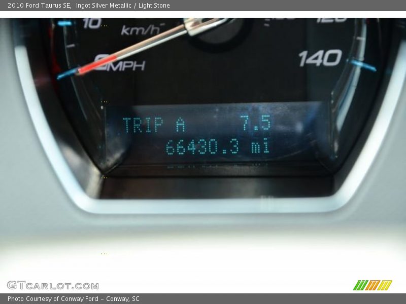 Ingot Silver Metallic / Light Stone 2010 Ford Taurus SE