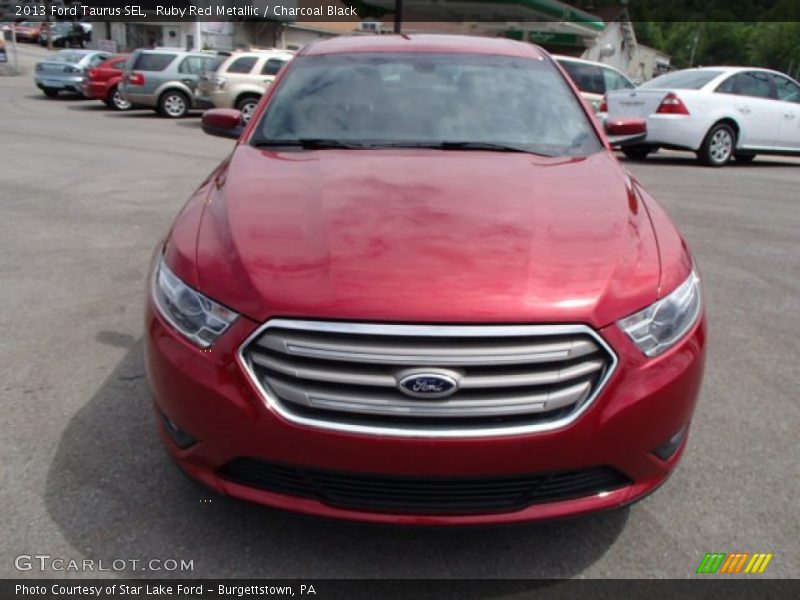 Ruby Red Metallic / Charcoal Black 2013 Ford Taurus SEL