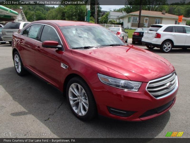 Ruby Red Metallic / Charcoal Black 2013 Ford Taurus SEL