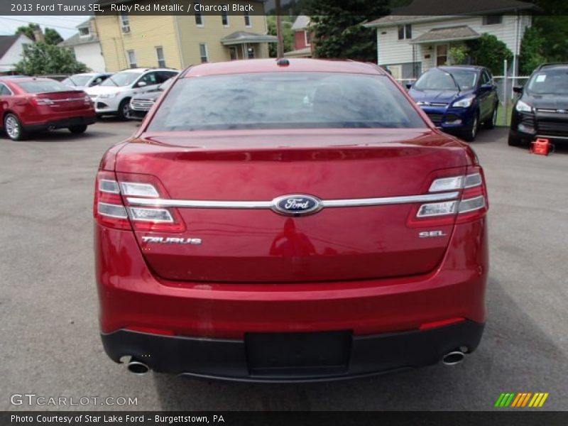 Ruby Red Metallic / Charcoal Black 2013 Ford Taurus SEL